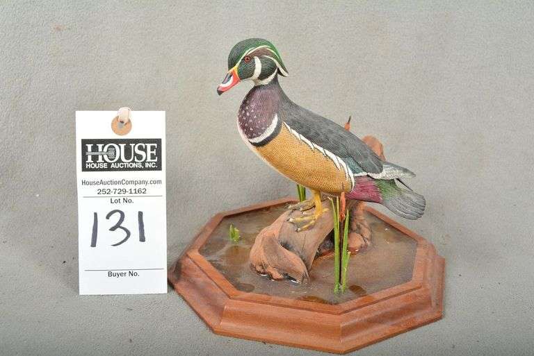 Wood duck drake - standing on driftwood, by Larry Tawes, Jr., Salisbury, MD, dated Oct. 25, 1983, signed by the maker image