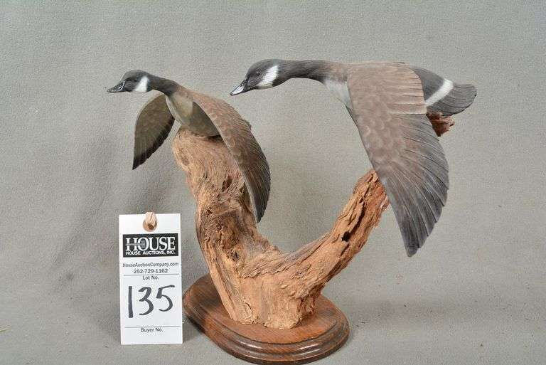 Two miniature Canada Geese in flight, mounted on driftwood, by unknown maker, outstanding detailed carving and painting image