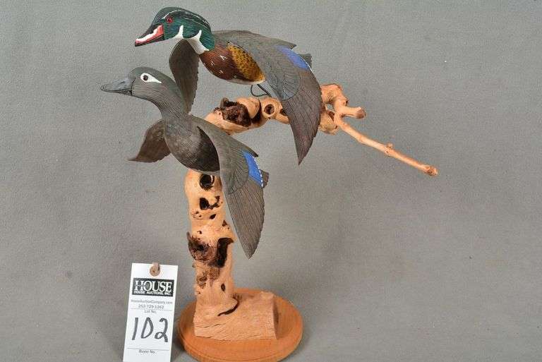 Pair of miniature Wood ducks in flight, on driftwood, by Temp, Oak Island, NC, signed by the maker image