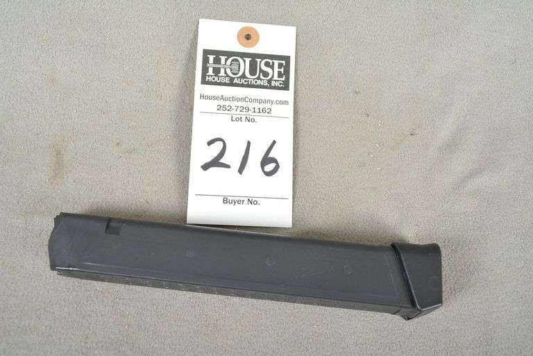 2 Unmarked magazines, 1 High Capacity, new and unmarked and 1 used markings shown, no caliber marking, NO PISTOL image