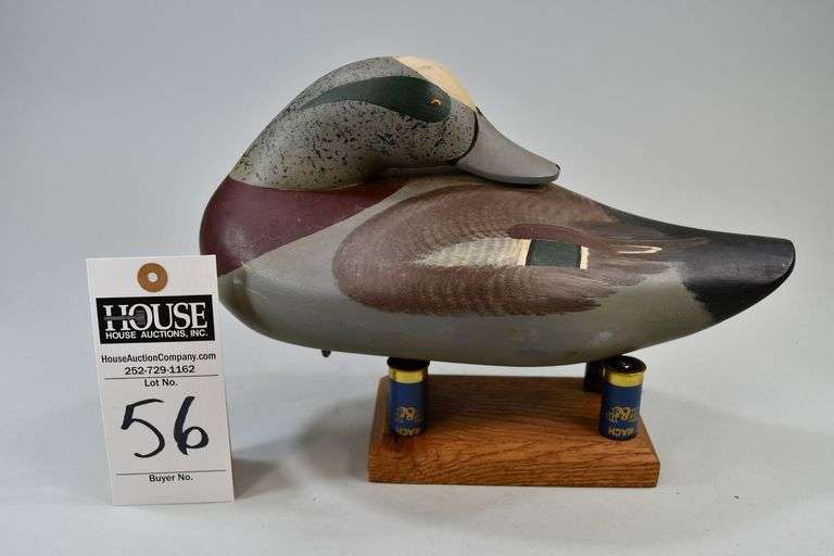 Wigeon, drake, preening, Carver: Paul Gibson, Havre de Grace, MD. All of Paul Gibson's decoys were hand-made until he bought Madison Mitchell’s lathe.  He carved in the Havre de Grace style, but made the bodies and tails of his birds thicker than usual and gave them shorter necks. Excellent painting technique. image