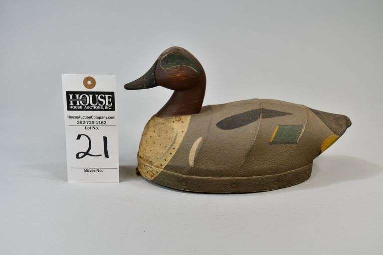 Green Wing Teal, drake, canvas stretch, Carver: "DBH." Whoever "DBH" is remains a mystery but he made fine canvas decorative decoys like this one with finely carved heads, nice, clean paints. Bottom has "DBH" carved in. image