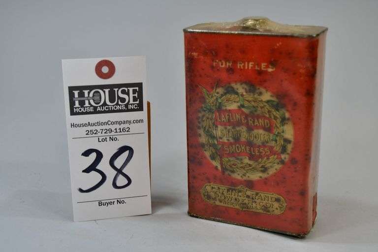 Gun Powder Tin, Gun Powder tin procuced by Laflin & Rand Sharpshooter Smokeless, Laflin & Rand Powder Company, New York, NY. The back of the tin has the conversion rates for powder to caliber for black powder rifles.  Tin has rust damage and is wrapped in plastic. image