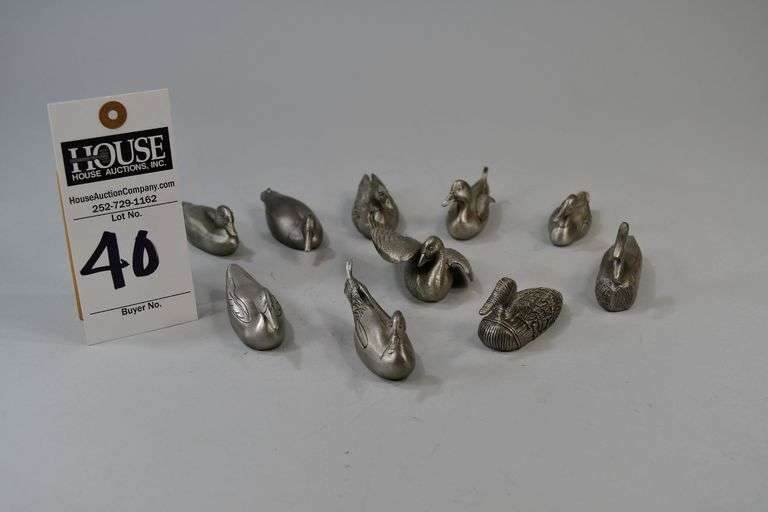 Set of 10 pewter miniture decoy figurines, Set of fine pewter decoy figurines made for George deLodzia by Chilmark Fine Pewter USA © 1980. 1. Snow Goose / Ward Bros, 2. Canvasback c. 1000AD US Indian Nevada, 3. Old Squaw / Ward Bros, 4. Pintail, L.T. Ward, 1960, 5. Black Duck / Ben Holmes, 1876, 6. Mason Premier Sheldrake, c. 1910, 7. Mallard / "Shang" Wheeler, 1922, 8. Primitice Scaup, late 1700s, 9. Ward Bros Goose, 1960, 10. Wood Duck / New England, c. 1930. image