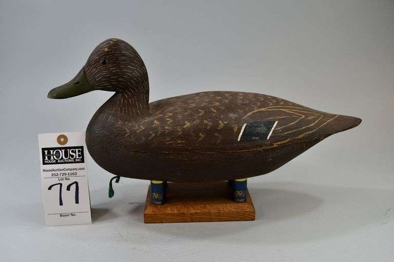 Black Duck, Carver: T. Street as carved in the bottom. No information available. Has a crack around the body where the wood is joined together. image