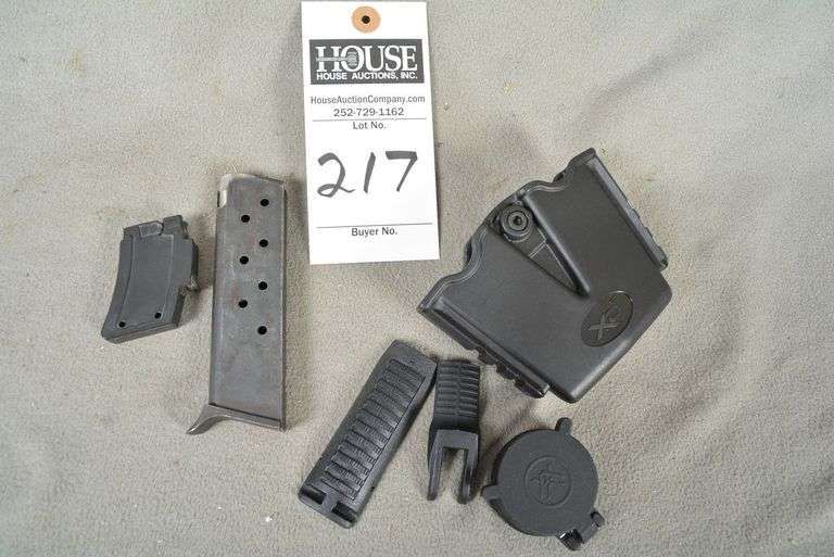2 Magazines, (1) P-8 Caliber not marked, (1) .22 cal, 1 magazine holder-belt style for 1911 9mm or .40 cal, NO PISTOL image