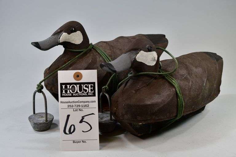 Ruddy Duck pair, canvas, Carver: Jimmy Garrett, Shawboro / Knotts Island, NC. Jimmy was an avid hunter, guide, cook, and decoy maker.  This pair come with weights. The bottoms have keels and have "JG" carved in. image
