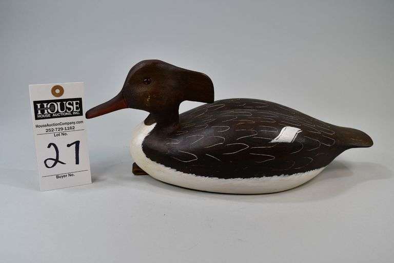 Red-breasted Merganser, hen, Carver: Norman Hancock, Harkers Island, NC. Norman Hancock was one of the "Original Seven" founders of the Core Sound Decoy Guild. On the bottom, "Norman Hancock, Harkers Island, NC, 1987" is written in pen and there is a weight mounted to the side for flotation and a leather anchor attachment. image