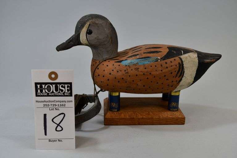 Blue Wing Teal, drake, Carver: Steve C. "Bubbles" Merritt, Chincoteague, VA.  This blue wing teal drake is stamped "SCM" and has a weight on the bottom image