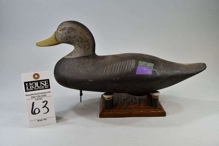 Black Duck, Carver: Bob Jobes, Aberdeen, MD. Bob is the oldest son of Captain Harry R. Jobes who all carve decoys and are nationally noted for their wooden decoys.   Bob used a scratch paint technique on this decoy. Bottom: "Bob Jobes" scratched in the bottom. image