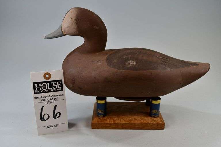 Redhead, hen, Carver: Paul Gibson, Havre de Grace, MD. All of Paul Gibson's decoys were hand-made until he bought Madison Mitchell’s lathe. Paul is one of the best painters to come out of the Havre de Grace region. This decoy is signed in ink: "Paul Gibson, Havre de Grace, MD, Maker & Painter." image