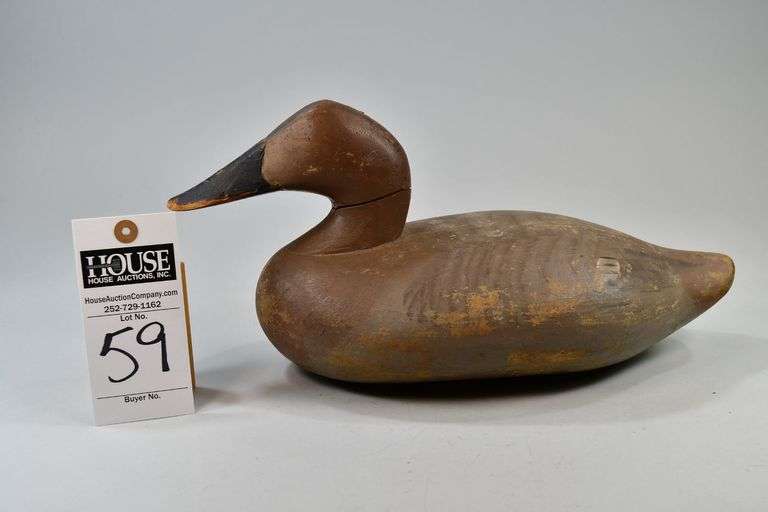 Canvasback, hen, Carver: Madison Mitchell, Havre de Grace, MD. Madison Mitchell, who once said all he wanted to do was be a "good funeral director and carve things out of wood in his free time."  He carved tens of thousands of decoys throughout his 60-year career.  Along the way to becoming “the dean of Havre de Grace decoy makers,” image