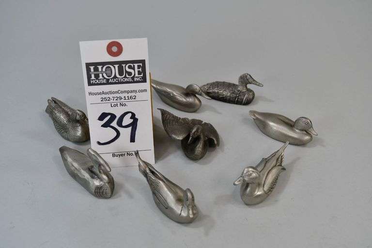 set of 9 pewter miniature decoy figurines, Set of fine pewter decoy figurines made for George deLodzia by Chilmark Fine Pewter USA © 1980. 1. Snow Goose / Ward Bros, 2. Canvasback c. 1000AD US Indian Nevada, 3. Old Squaw / Ward Bros, 4. Pintail, L.T. Ward, 1960, 5. Black Duck / Ben Holmes, 1876, 6. Mason Premier Sheldrake, c. 1910, 7. Mallard / "Shang" Wheeler, 1922, 8. Primitice Scaup, late 1700s, 9. Ward Bros Goose, 1960. image