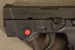 SMITH & WESSON Model M&P BODYGUARD, New in original factory case with CRIMSON TRACE SIGHTS and two magazines, Cal. .380 Auto Semi-Auto Handgun, 2.75" barrel, Ser #KEE4883