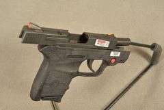 SMITH & WESSON Model M&P BODYGUARD, New in original factory case with CRIMSON TRACE SIGHTS and two magazines, Cal. .380 Auto Semi-Auto Handgun, 2.75" barrel, Ser #KEE4883