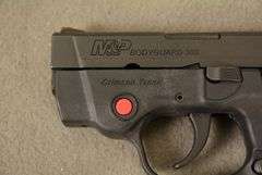 SMITH & WESSON Model M&P BODYGUARD, New in original factory case with CRIMSON TRACE SIGHTS and two magazines, Cal. .380 Auto Semi-Auto Handgun, 2.75" barrel, Ser #KEE4883