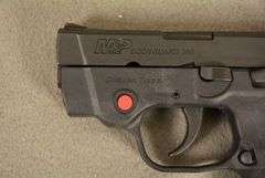 SMITH & WESSON Model M&P BODYGUARD, New in original factory case with CRIMSON TRACE SIGHTS and two magazines, Cal. .380 Auto Semi-Auto Handgun, 2.75" barrel, Ser #KEE4883