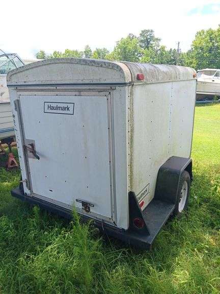 1989 HAULMARK Enclosed Cargo Trailer, APPROX. 8 ft long x 5 ft wide, and APPROX. 5-1/2 ft tall inside, no apparent leaks, VIN  16HGB0810LP000345