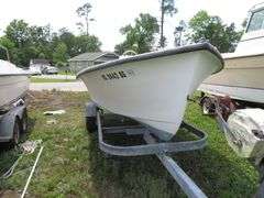 ATLANTIC 18 foot Center Console Fiberglass Boat with motor well, 70 hp EVINRUDE OUTBOARD Motor & LONG galvanized boat trailer, Boat Hull ID ATNOO868G585