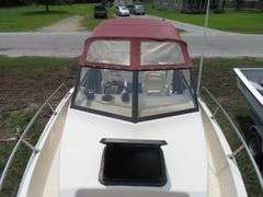 1992  KEY WEST 20 foot with CUDDY CABIN, with electronics, portable toilet, accessories, with 175 HP MARINER Outboard Motor, Hull ID  KWEWA189E292, with EZ LOADER Galvanized Trailer