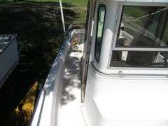 1990  SHAMROCK  PILOT HOUSE, Inboard gasoline engine, boat in very good condition, look at all photos, Hull ID - SHA02775J990, with galvanized boat trailer