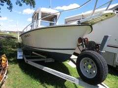 1990  SHAMROCK  PILOT HOUSE, Inboard gasoline engine, boat in very good condition, look at all photos, Hull ID - SHA02775J990, with galvanized boat trailer