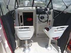 1992  KEY WEST 20 foot with CUDDY CABIN, with electronics, portable toilet, accessories, with 175 HP MARINER Outboard Motor, Hull ID  KWEWA189E292, with EZ LOADER Galvanized Trailer