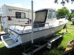 1990  SHAMROCK  PILOT HOUSE, Inboard gasoline engine, boat in very good condition, look at all photos, Hull ID - SHA02775J990, with galvanized boat trailer