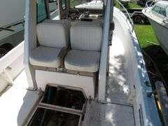 1990  SHAMROCK  PILOT HOUSE, Inboard gasoline engine, boat in very good condition, look at all photos, Hull ID - SHA02775J990, with galvanized boat trailer