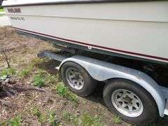 1992  KEY WEST 20 foot with CUDDY CABIN, with electronics, portable toilet, accessories, with 175 HP MARINER Outboard Motor, Hull ID  KWEWA189E292, with EZ LOADER Galvanized Trailer