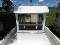 1990  SHAMROCK  PILOT HOUSE, Inboard gasoline engine, boat in very good condition, look at all photos, Hull ID - SHA02775J990, with galvanized boat trailer