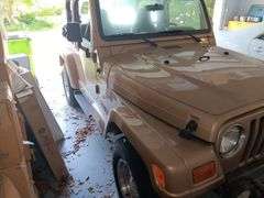 1999 JEEP  WRANGLER 4OL, Has Clean CARFAX Report, has had extensive remodeling work, excellent condition, runs and drives as it should, Manuel Transmission, Mileage showing 91,940, VIN  1J4FY49S3XP444192,