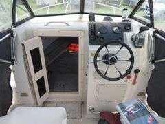 1992  KEY WEST 20 foot with CUDDY CABIN, with electronics, portable toilet, accessories, with 175 HP MARINER Outboard Motor, Hull ID  KWEWA189E292, with EZ LOADER Galvanized Trailer