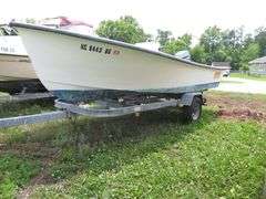 ATLANTIC 18 foot Center Console Fiberglass Boat with motor well, 70 hp EVINRUDE OUTBOARD Motor & LONG galvanized boat trailer, Boat Hull ID ATNOO868G585