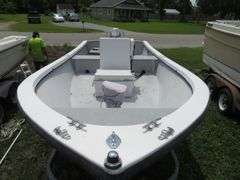 ATLANTIC 18 foot Center Console Fiberglass Boat with motor well, 70 hp EVINRUDE OUTBOARD Motor & LONG galvanized boat trailer, Boat Hull ID ATNOO868G585