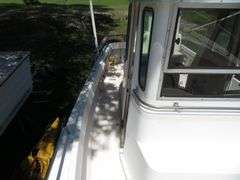 1990  SHAMROCK  PILOT HOUSE, Inboard gasoline engine, boat in very good condition, look at all photos, Hull ID - SHA02775J990, with galvanized boat trailer