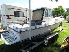 1990  SHAMROCK  PILOT HOUSE, Inboard gasoline engine, boat in very good condition, look at all photos, Hull ID - SHA02775J990, with galvanized boat trailer