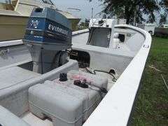 ATLANTIC 18 foot Center Console Fiberglass Boat with motor well, 70 hp EVINRUDE OUTBOARD Motor & LONG galvanized boat trailer, Boat Hull ID ATNOO868G585
