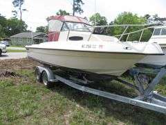 1992  KEY WEST 20 foot with CUDDY CABIN, with electronics, portable toilet, accessories, with 175 HP MARINER Outboard Motor, Hull ID  KWEWA189E292, with EZ LOADER Galvanized Trailer