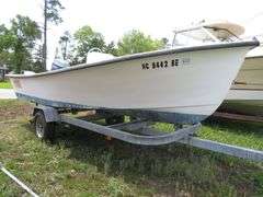 ATLANTIC 18 foot Center Console Fiberglass Boat with motor well, 70 hp EVINRUDE OUTBOARD Motor & LONG galvanized boat trailer, Boat Hull ID ATNOO868G585