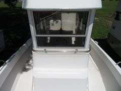 1990  SHAMROCK  PILOT HOUSE, Inboard gasoline engine, boat in very good condition, look at all photos, Hull ID - SHA02775J990, with galvanized boat trailer