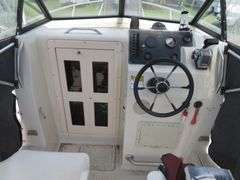 1992  KEY WEST 20 foot with CUDDY CABIN, with electronics, portable toilet, accessories, with 175 HP MARINER Outboard Motor, Hull ID  KWEWA189E292, with EZ LOADER Galvanized Trailer