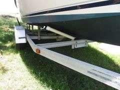 1990  SHAMROCK  PILOT HOUSE, Inboard gasoline engine, boat in very good condition, look at all photos, Hull ID - SHA02775J990, with galvanized boat trailer