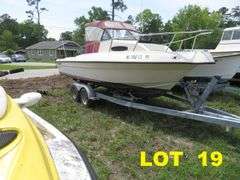 1992  KEY WEST 20 foot with CUDDY CABIN, with electronics, portable toilet, accessories, with 175 HP MARINER Outboard Motor, Hull ID  KWEWA189E292, with EZ LOADER Galvanized Trailer