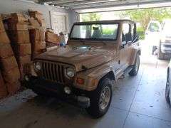 1999 JEEP  WRANGLER 4OL, Has Clean CARFAX Report, has had extensive remodeling work, excellent condition, runs and drives as it should, Manuel Transmission, Mileage showing 91,940, VIN  1J4FY49S3XP444192,