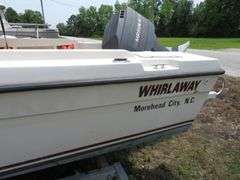 1992  KEY WEST 20 foot with CUDDY CABIN, with electronics, portable toilet, accessories, with 175 HP MARINER Outboard Motor, Hull ID  KWEWA189E292, with EZ LOADER Galvanized Trailer