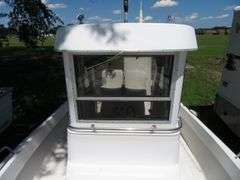 1990  SHAMROCK  PILOT HOUSE, Inboard gasoline engine, boat in very good condition, look at all photos, Hull ID - SHA02775J990, with galvanized boat trailer