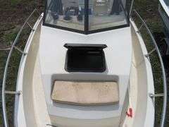 1992  KEY WEST 20 foot with CUDDY CABIN, with electronics, portable toilet, accessories, with 175 HP MARINER Outboard Motor, Hull ID  KWEWA189E292, with EZ LOADER Galvanized Trailer