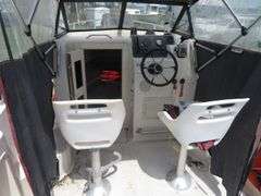 1992  KEY WEST 20 foot with CUDDY CABIN, with electronics, portable toilet, accessories, with 175 HP MARINER Outboard Motor, Hull ID  KWEWA189E292, with EZ LOADER Galvanized Trailer