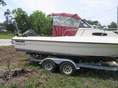 1992  KEY WEST 20 foot with CUDDY CABIN, with electronics, portable toilet, accessories, with 175 HP MARINER Outboard Motor, Hull ID  KWEWA189E292, with EZ LOADER Galvanized Trailer